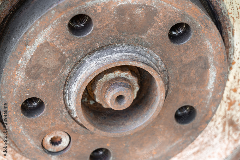 Rusty wheel hub car with drum brake system. Rusty wheel hub car with drum brake system.