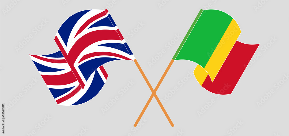 Crossed and waving flags of Mali and the UK Crossed and waving flags of Mali and the UK