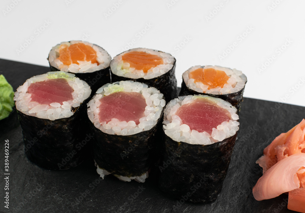 Salmon Hosomaki Sushi or Thin Maki Sushi Rolls Isolated Salmon Hosomaki Sushi or Thin Maki Sushi Rolls Isolated