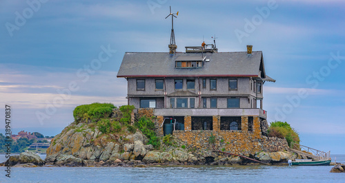 Scenic architecture near Newport, RI in Narragansett Bay - Clingstone & Rose Island Lighthouse  photo
