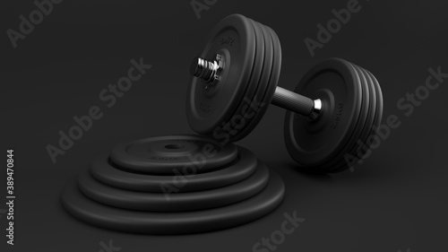 Black gym dumbbell on discs.