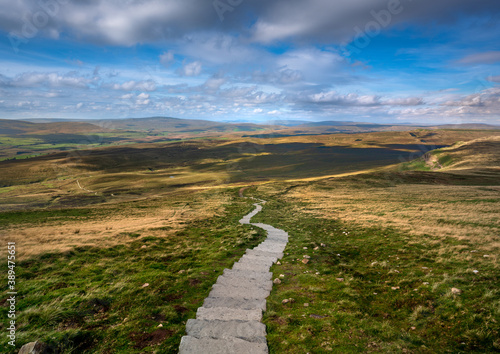 Yorkshire Dales pathway of the three peaks trail. England. Landscape viewpoint near summit of pen y ghent