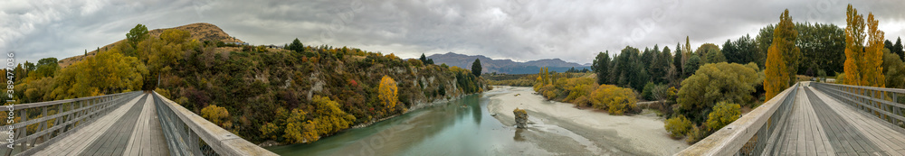Panoramic from the Shotover Bridge depicting both ends from the middle, Queenstown Area, South Island, New Zealand Panoramic from the Shotover Bridge depicting both ends from the middle, Queenstown Area, South Island, New Zealand