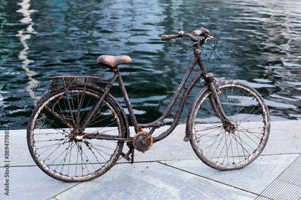 Fototapeta premium An old sunken Bicycle that was pulled out of the water