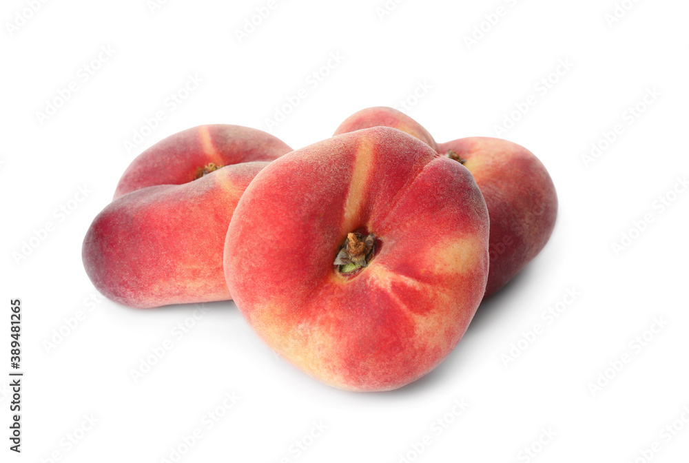 Fresh ripe donut peaches on white background Fresh ripe donut peaches on white background