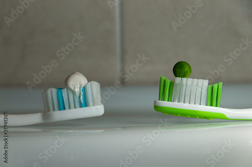 comparison of recommended toothpaste size equivalent to the size of a pea