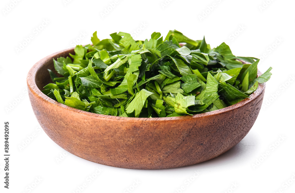 Fresh parsley in bowl on white background Fresh parsley in bowl on white background