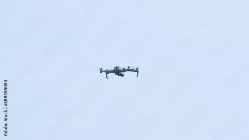 Drones camera flying in high blue sky on nature background. Digital model photo or video technology concept. Drones camera flying in high blue sky on nature background. Digital model photo or video technology concept.