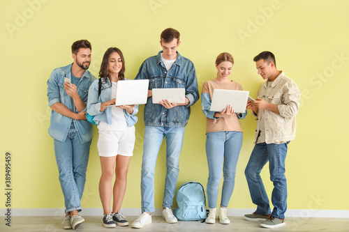 Students with modern device...