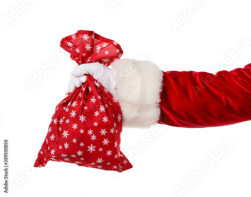 Santa claus hand holding re...