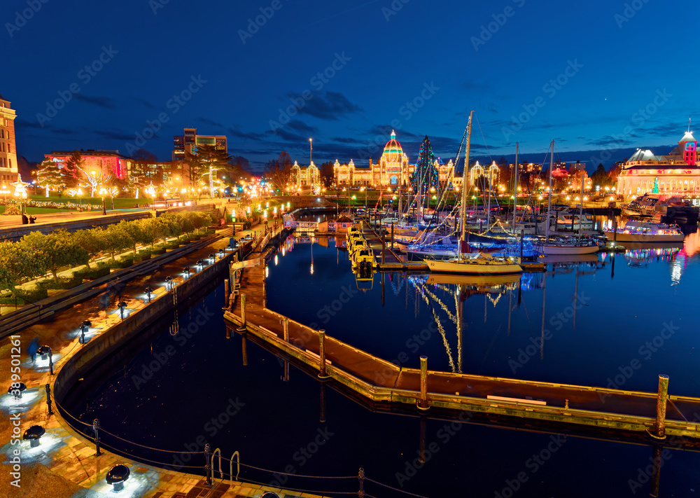 Inner Harbor in Victoria BC, Vancouver Island, Canada, decorated with festive lights during Christmas time