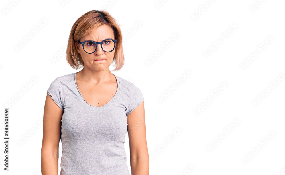 Young blonde woman wearing casual clothes depressed and worry for distress, crying angry and afraid. sad expression. Young blonde woman wearing casual clothes depressed and worry for distress, crying angry and afraid. sad expression.