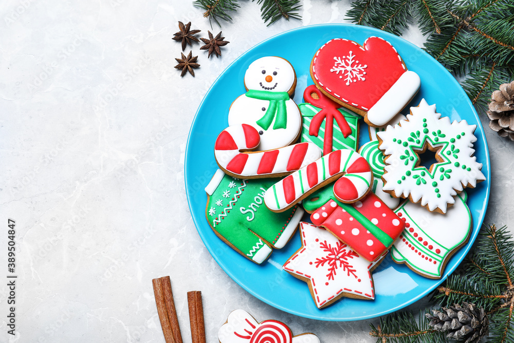 Delicious Christmas cookies on light marble table, flat lay. Space for text