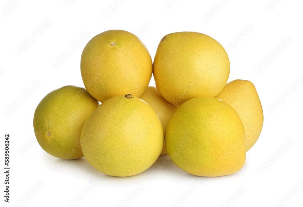 Fresh exotic pomelo fruits isolated on white Fresh exotic pomelo fruits isolated on white