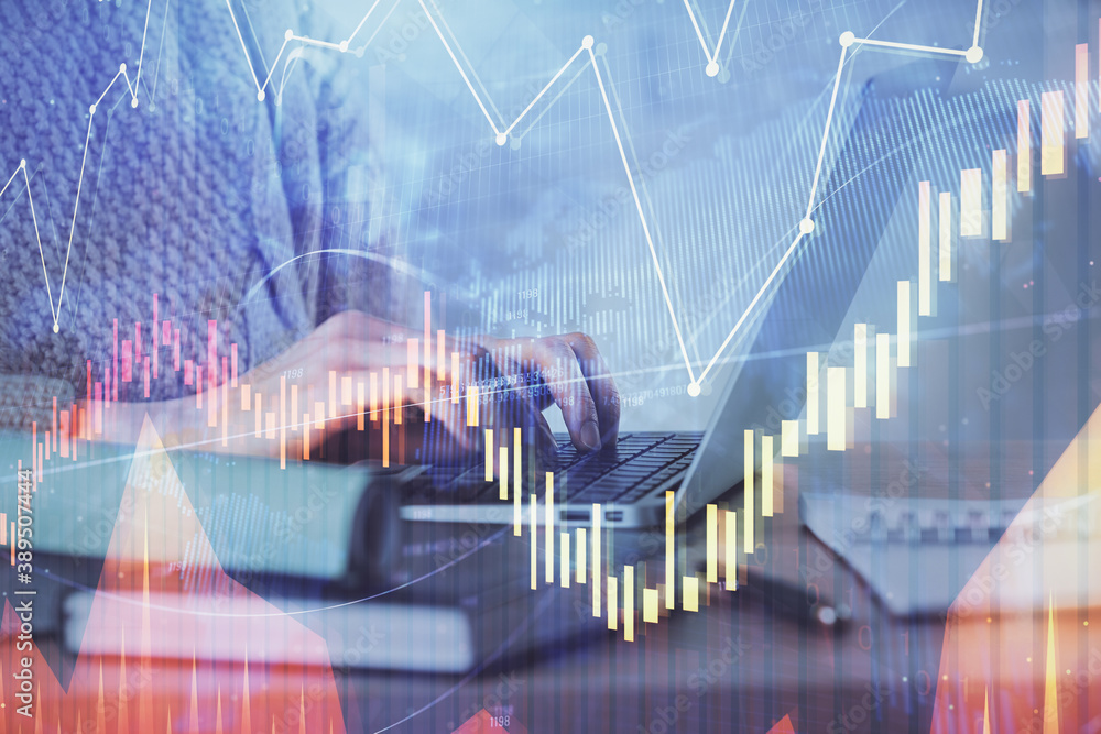 Double exposure of woman hands typing on computer and forex chart hologram drawing. Stock market analysis concept. Double exposure of woman hands typing on computer and forex chart hologram drawing. Stock market analysis concept.