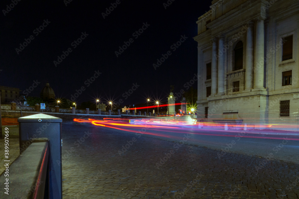 Fototapeta premium Car light streaks in the city of rome in italy at night.