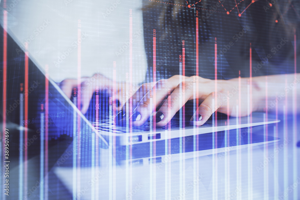 Double exposure of woman hands typing on computer and forex chart hologram drawing. Stock market invest concept. Double exposure of woman hands typing on computer and forex chart hologram drawing. Stock market invest concept.