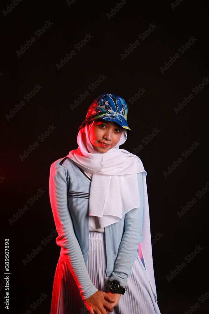 Fashion portrait of young beautiful asian muslim woman with wearing hijab. Fashion portrait of young beautiful asian muslim woman with wearing hijab.