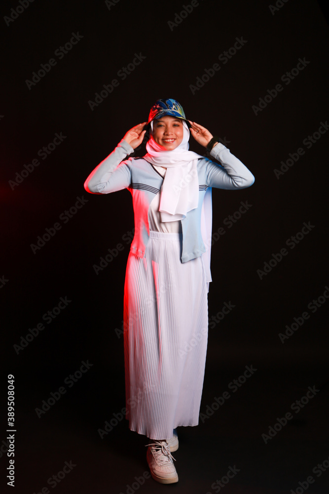 Fashion portrait of young beautiful asian muslim woman with wearing hijab. Fashion portrait of young beautiful asian muslim woman with wearing hijab.