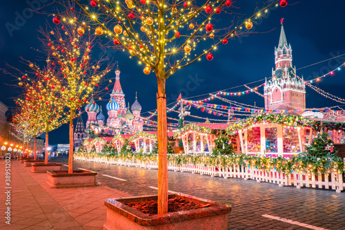 Christmas Moscow. Landmarks of Russia in New Year. Christmas market near Kremlin. Red Square in Moscow. New Year's festivities in Russia. Moscow on a blue night. Kremlin chimes in new year.