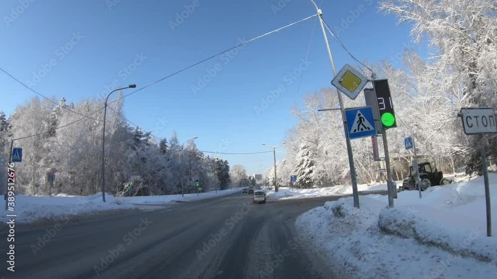 Novosibirsk Academgorodok in winter. Turn from Academician Lavrentyev Avenue to Nikolaev Street Novosibirsk Academgorodok in winter. Turn from Academician Lavrentyev Avenue to Nikolaev Street