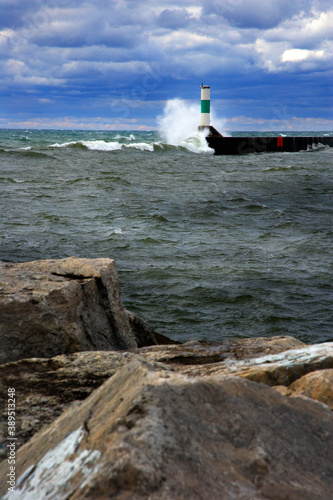 Waves crashing the shoreline, sea wall and giant rocks of Lake Superior © Jill Greer