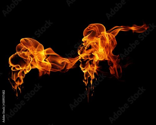 Fire flames black background © photodeedooo