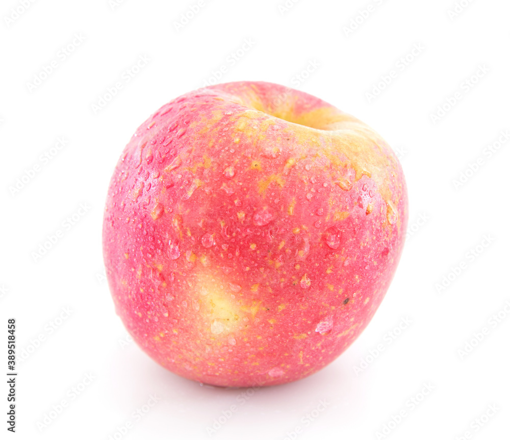 A red apple with water drops on white background A red apple with water drops on white background