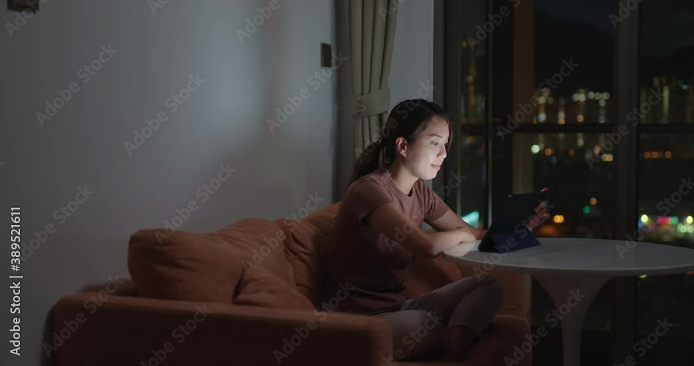 Woman watch on tablet computer at home Woman watch on tablet computer at home