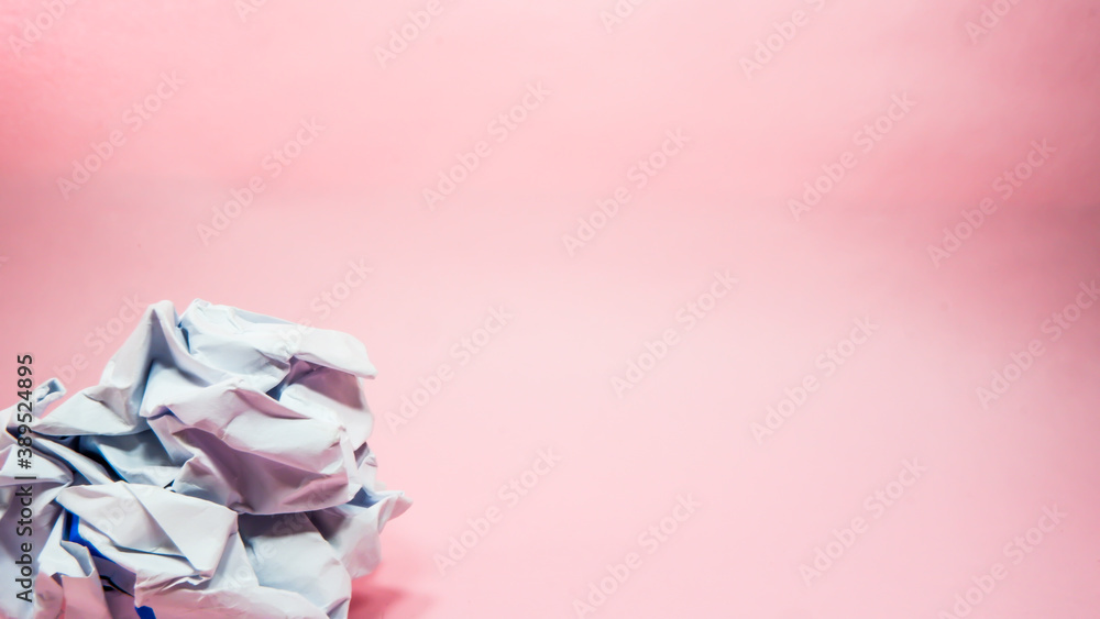 Crumpled paper in pink background Crumpled paper in pink background