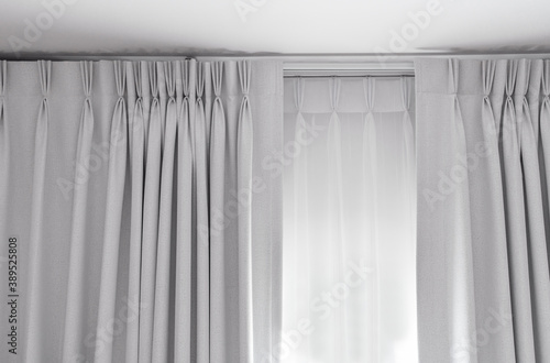 Two layers curtain with rails, installed on ceiling, translucent and blocking lights curtain
