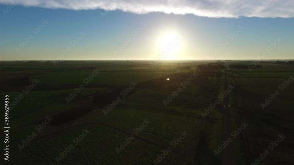 Summer Sunset Above Flat Farming Land in Countryside of Argentina, Aerial View Summer Sunset Above Flat Farming Land in Countryside of Argentina, Aerial View