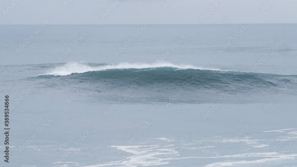 Big wave in Nazaré, Portugal. Nazaré is a small village in Portugal with the biggest waves in the world. Big wave in Nazaré, Portugal. Nazaré is a small village in Portugal with the biggest waves in the world.