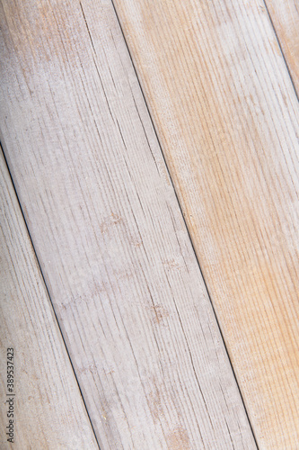 Wood grain background on shabby yellow planks
