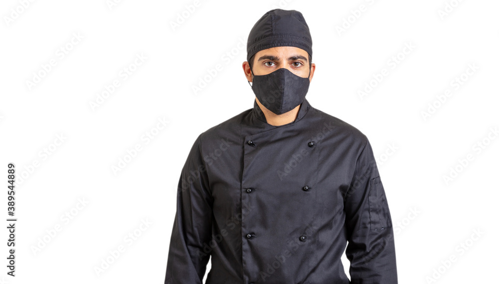 Chef in coronavirus days. Young person with face protection mask isolated on white background.
