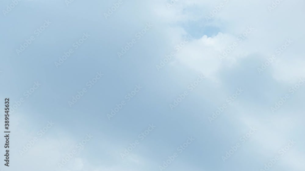 4K sky time lapse, White and blue clouds background. Cloud nature, timelapse of skyscrapers 4K sky time lapse, White and blue clouds background. Cloud nature, timelapse of skyscrapers