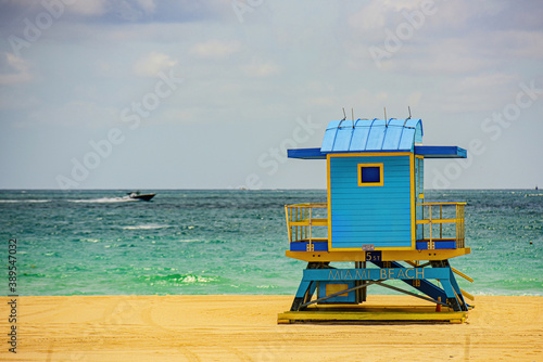 Miami South Beach lifeguard tower and coastline with cloud and blue sky. Miami Beach, Florida. © Volodymyr