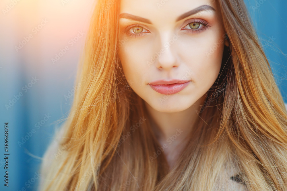 Close up portrait of a beautiful girl at the glowing sun. Amazing model looking at camera.Warm artwork. High quality photo. Close up portrait of a beautiful girl at the glowing sun. Amazing model looking at camera.Warm artwork. High quality photo.