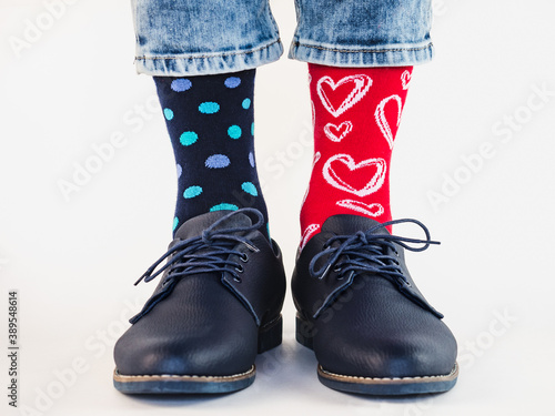 Men's legs, trendy shoes and bright socks. Close-up. Style, beauty and elegance concept © Svetlana