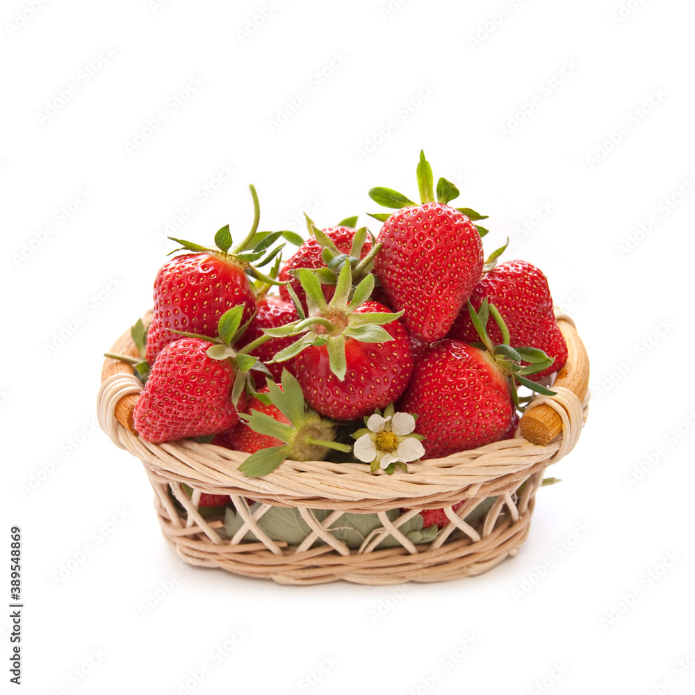 Ripe strawberries in the basket on a white background Ripe strawberries in the basket on a white background