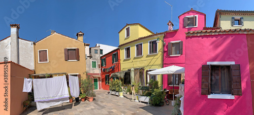 Brightly coloured houses at Burano, island in the Venetian Lagoon, Venice, Italy photo