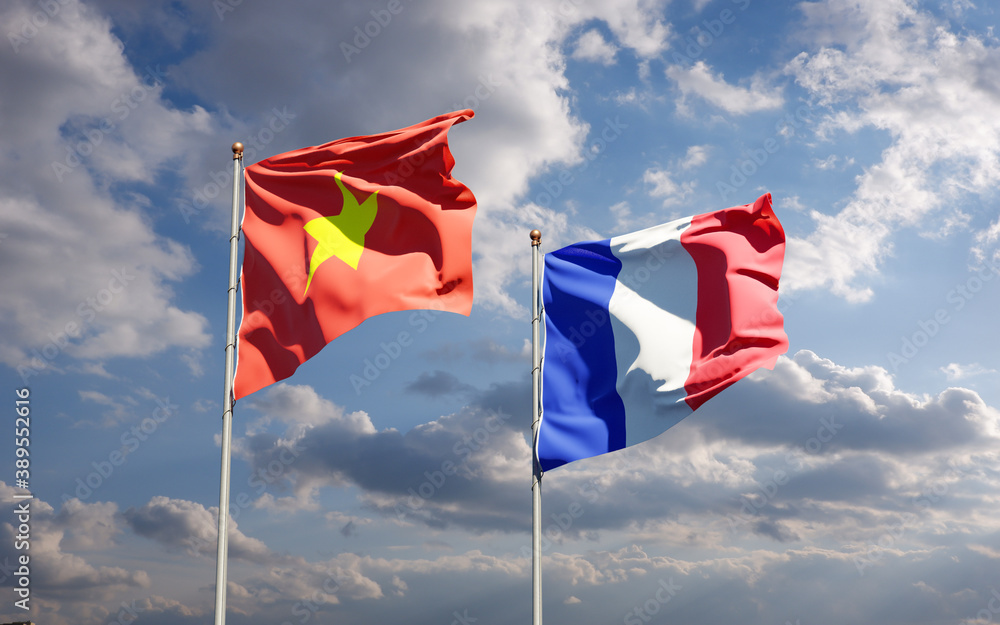 Beautiful national state flags of France and Vietnam together at the sky background. 3D artwork concept.