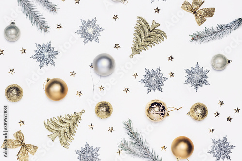 Christmas or New Year composition of golden and silver decor top view flat lay. photo