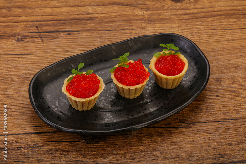 Apetizer - tartlet with red caviar Apetizer - tartlet with red caviar