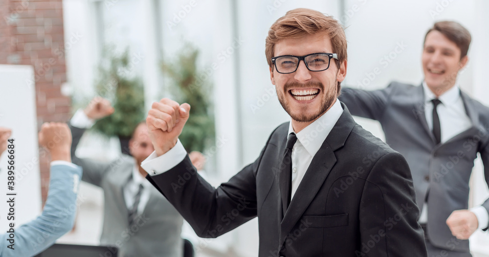 close up. jubilant entrepreneur standing in his office close up. jubilant entrepreneur standing in his office