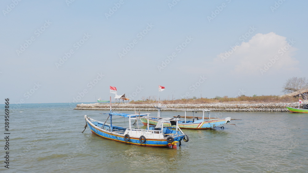 Obraz premium fishing boats on the beach