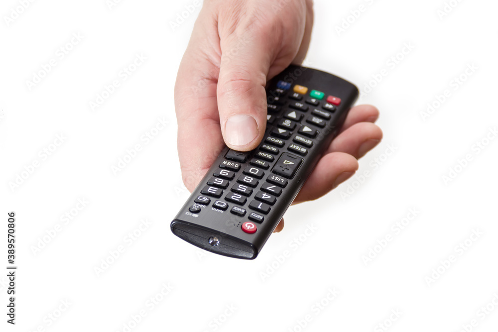 TV remote controller in man's hand on white background TV remote controller in man's hand on white background