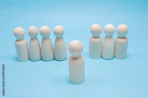 Stand out from the crowd wood figure and different concept