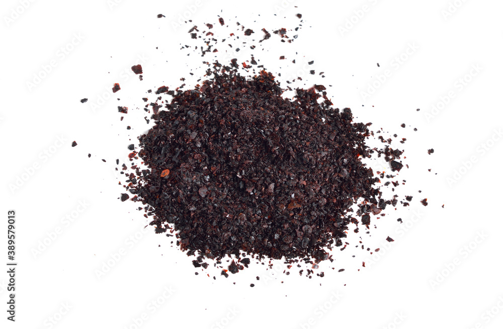 Urfa biber also known as isot pepper isolated on white Urfa biber also known as isot pepper isolated on white
