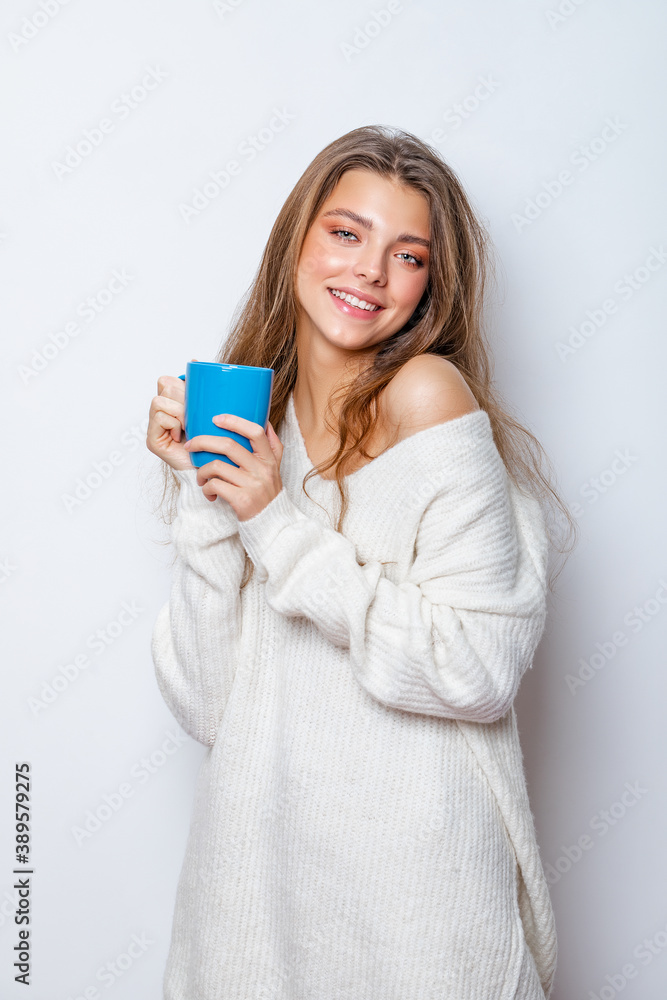Morning Relaxation. Beautiful Girl in the Morning enjoy a Cup of Tea. Relaxation. Close-up.  